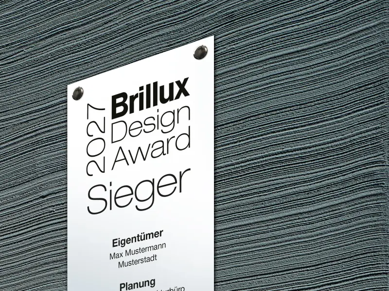 Signet Brillux Design Award hängt an der Wand