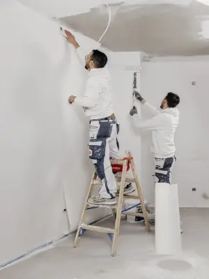 Vlies wird geklebt 